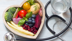 Gemüse, Obst und Stethoskop als Symbol für die Gesundheitsmesse in Gladbeck