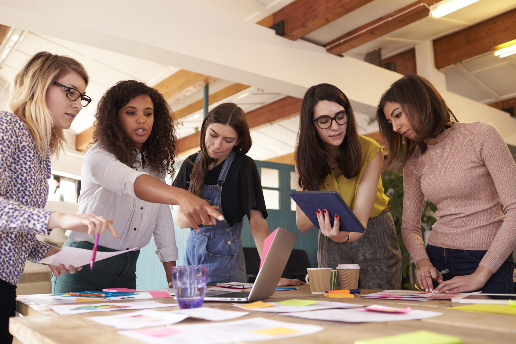 Female Designers Having Brainstorming Meeting In Office